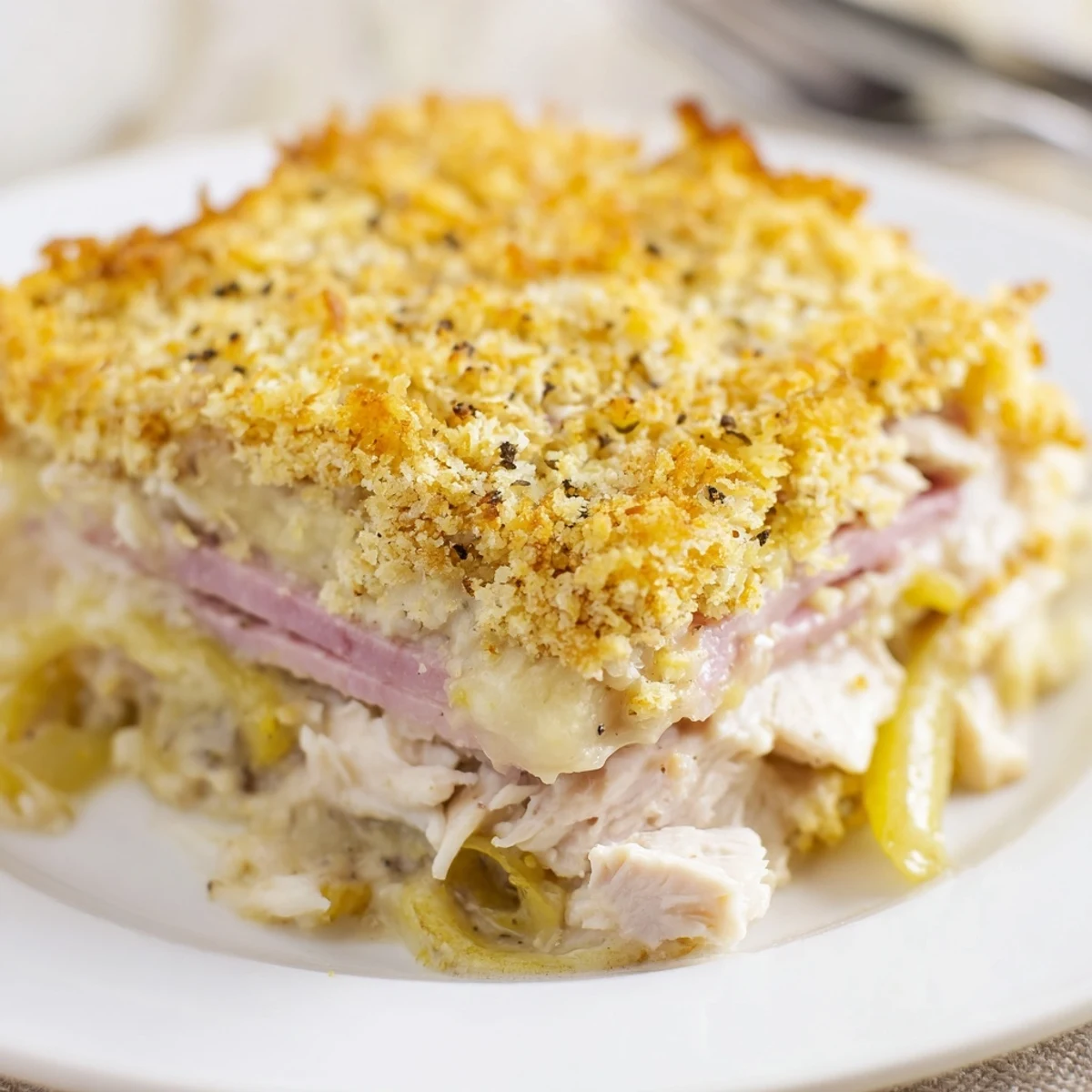 Hearty Chicken Cordon Bleu Casserole Recipe served warm with crisp green salad.
