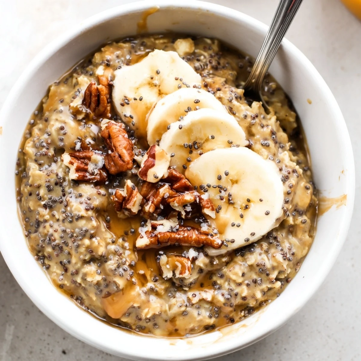 Brown Sugar Coffee Overnight Oats layered in mason jar, chilled for grab and go.