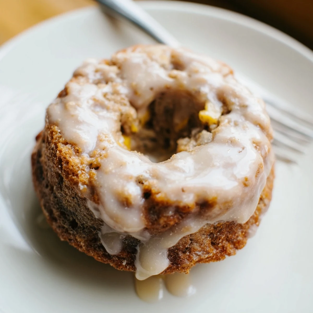 Banana Donuts with glossy vanilla glaze, golden edges and soft crumb