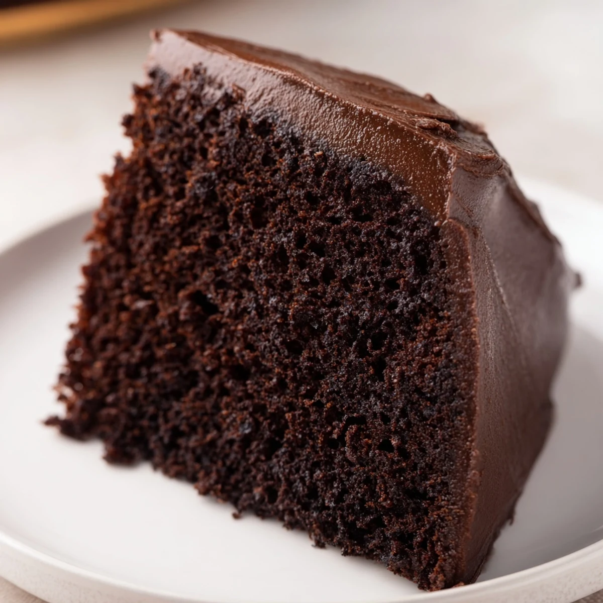 Moist chocolate cake with mayonnaise featuring a rich, tender crumb and decadent cocoa flavor