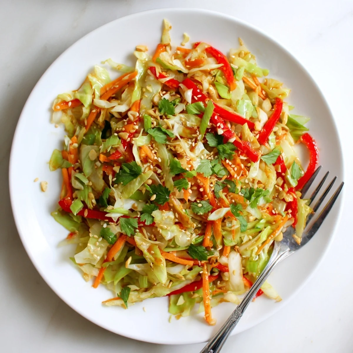Colorful cabbage stir fry recipe showcasing crisp vegetables coated in glossy savory sauce