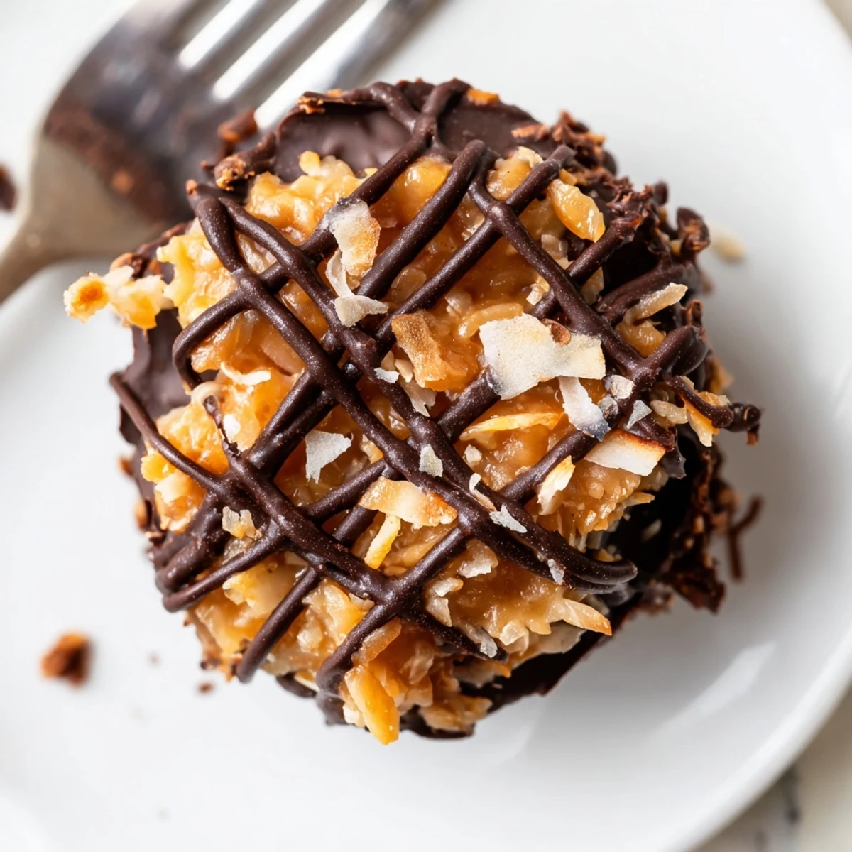 Rich dark chocolate coated no bake Samoa bites with sweet coconut caramel filling arranged neatly